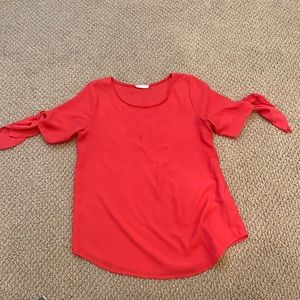 Blouse with ties on sleeve